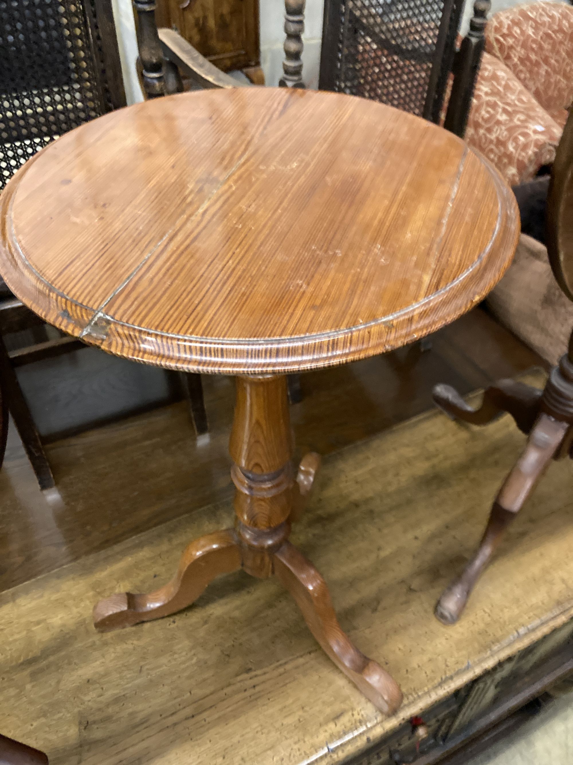 Three Victorian-style mahogany tripod wine tables, largest 49cm diameter